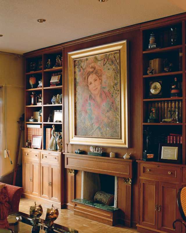 Portrait of the owner takes pride of place inside the home of Paloma Gómez Borrero