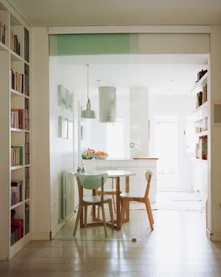 Glass-screened kitchen of the Lequerica home