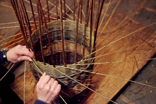 Traditional skills being used to weave willow baskets