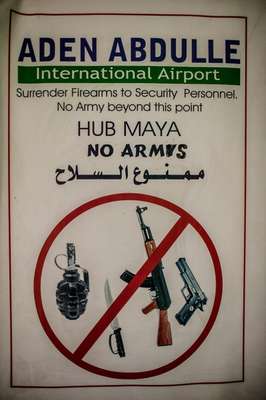 Poster banning weapons inside the airport
