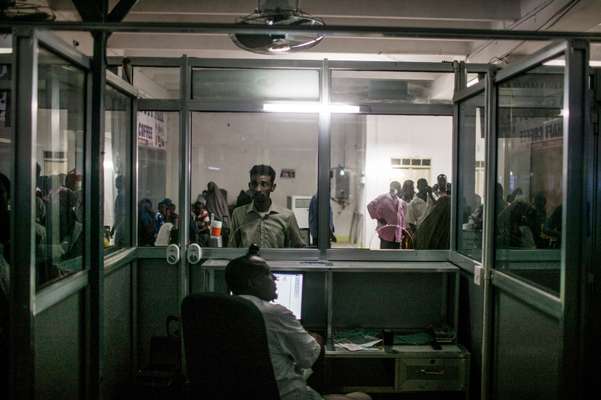 A Somali man waits to clear immigration