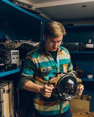 Engineer Tom O’Brien with an underwater camera