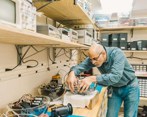 Engineer Mohsen Ahmed working on an underwater-camera casing