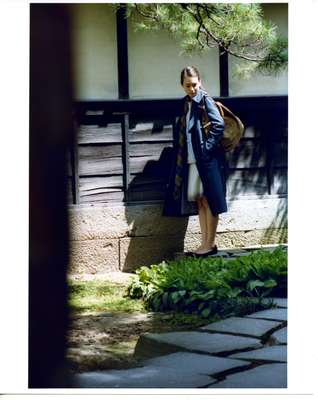 Coat by Drawer, top and skirt by Bottega Veneta, scarf by Deuxième Classe, bag by Giuzeppe Zanotti Design from L’Apartement 