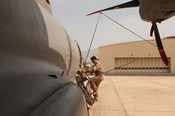 Maj Victor Sobrino of the Spanish airforce climbs into a Vigma patrol plane