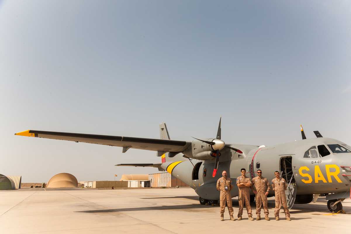 Spanish airforce personnel from the EU mission show off their  Vigma patrol plane on the Djibouti base airfield