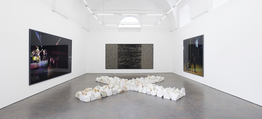 Richard Long stone work and canvas flanked by Jeff Wall photogaphs