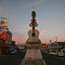 A giant copper statue of a guitar welcomes visitors to Paracho 