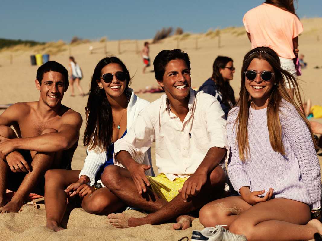 Locals enjoying the weekend sunshine at Guincho Beach