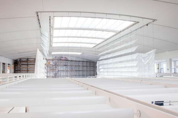 Skylight is enhanced by a structure made of sheets of glass