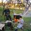 Cooking plum jam in the autumn