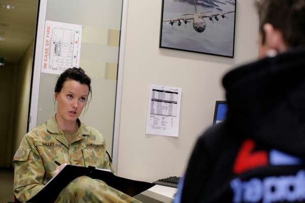  Corporal Renae Halley interviewing a prospective recruit for the Australian Defence Force