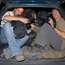 Photographers cram into a car as journalists escape Gori before advancing Russians