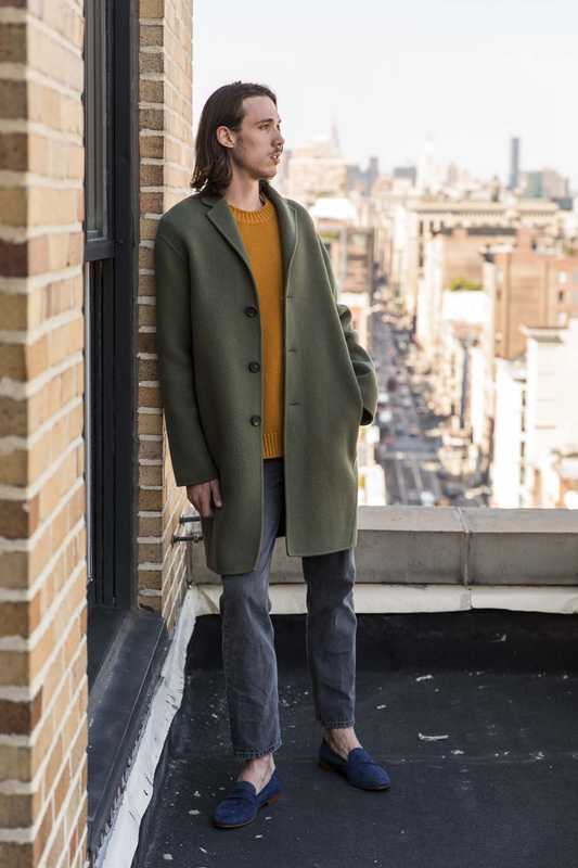 Boiled-wool coat, cashmere crewneck and suede loafers