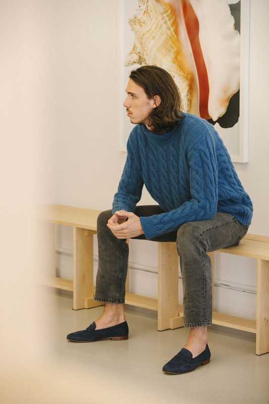 Cashmere cable-knit turtleneck and suede loafers 