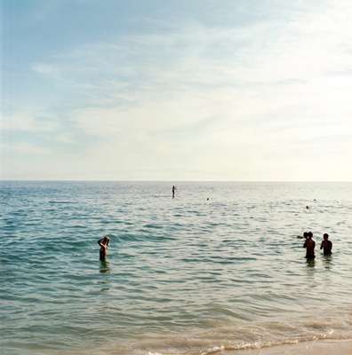 Cariocas cool off in the sea