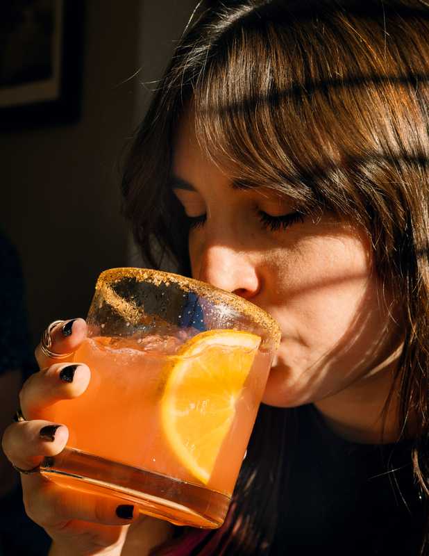 Rosana Toro, of Bienal, enjoying a cocktail at Oliva