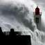 6 November 2000: wave hitting Les Sables D’olonne lighthouse during a storm