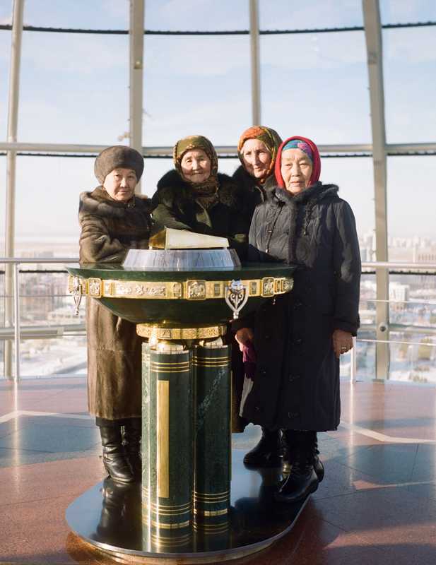 Women from eastern Kazakhstan atop the Bayterek Tower 