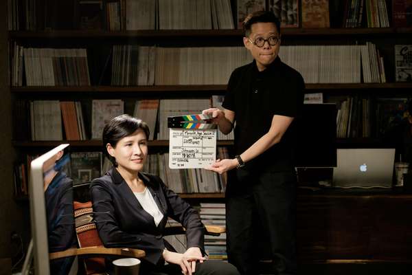 Art director Yu Feng preparing culture minister Cheng Li-chun for her interview