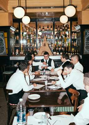 Waiters waiting for the  evening’s service run to  begin in Gemmayze