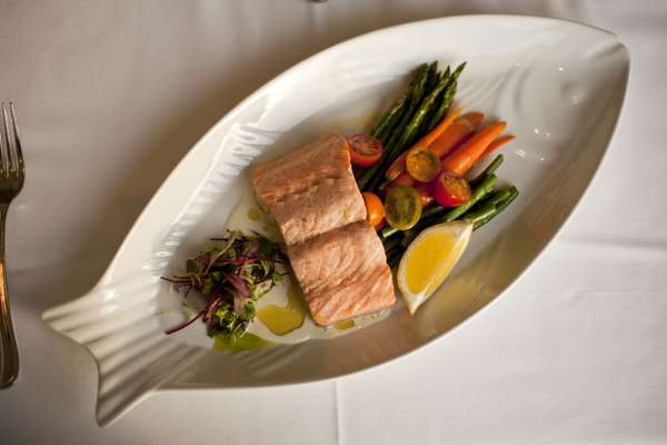 Poached salmon with market vegetables
