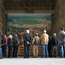 Tourists admire a photo of the airport inside Tempelhof’s hall