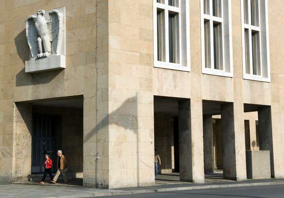 A Nazi-style eagle watches over passers-by