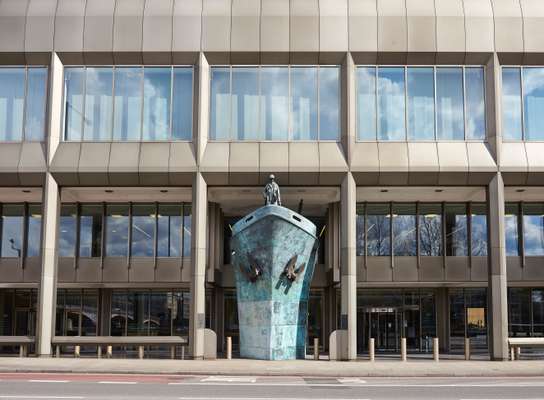 Bronze ship’s-prow sculpture from 2001  at the IMO entrance 