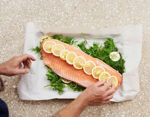 Salmon on a bed of herbs