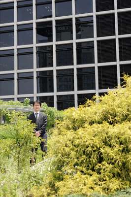 Yoriyuki Yamada among the green landscaping of Kajima’s office in Tokyo