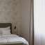 Pared-back guest rooms 