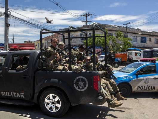 Troops from the Police Special Operations Battalion set out for the favelas.