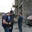 A Russian government official talks to an ITN crew after an attack on the old Jewish quarter in Tskhinvali