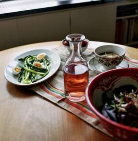 The meal, accompanied by a carafe of rosé