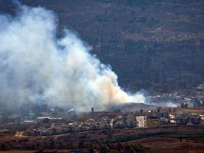 Hezbollah launches barrage of rockets at Israel following commander's killing