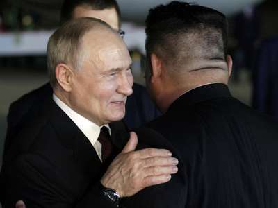 Vladimir Putin heads to Hanoi